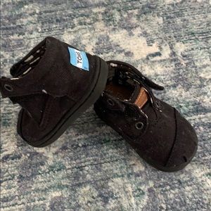 Worn once toms high top shoes